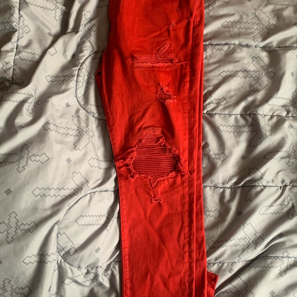 red amiri jeans for men (size 36).